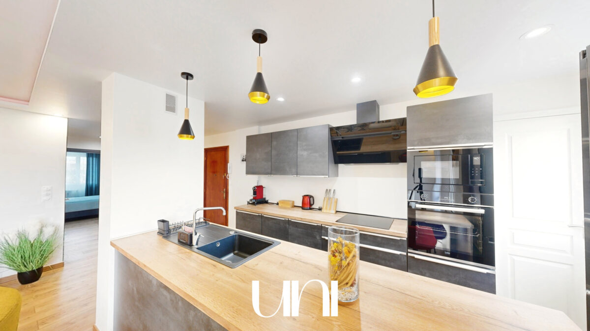 Appartement type T4 de 77.35m2 avec balcon, garage et cave à Caen