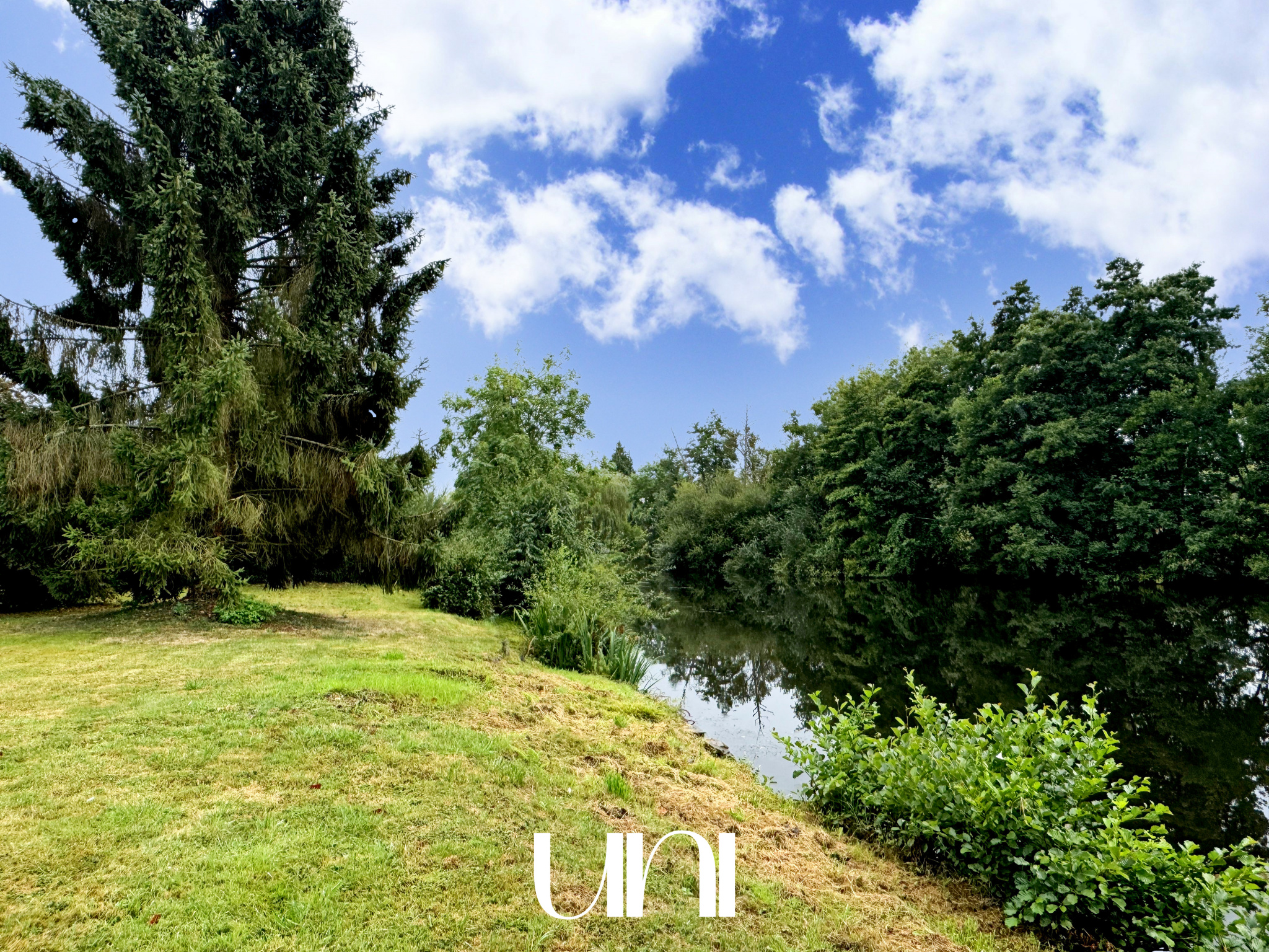 Maison de maître T6 située face à l'Orne